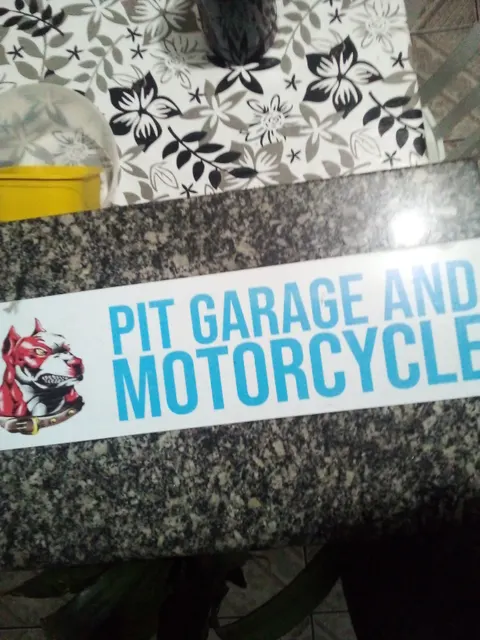 PIT GARAGE AND MOTORCYCLE
